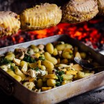 Rôtis et légumes au feu de bois